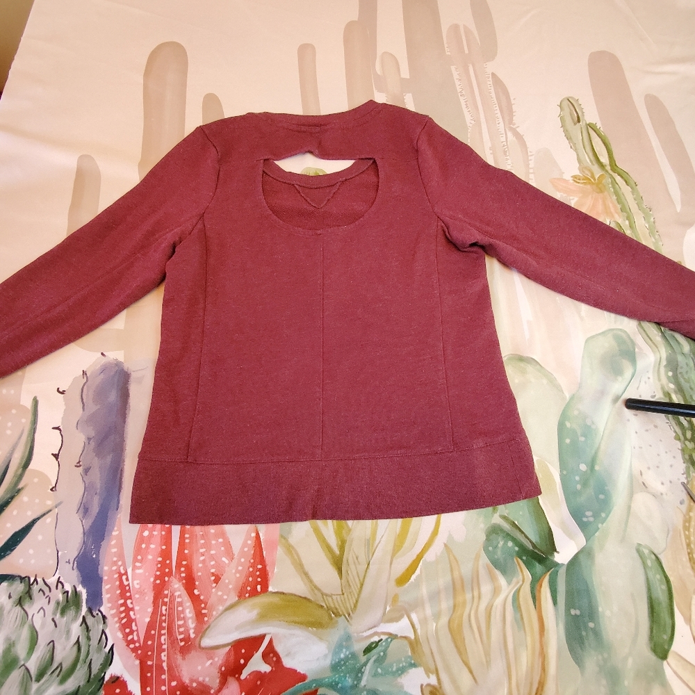 Maroon or Burgundy colored shirt with thumb holes